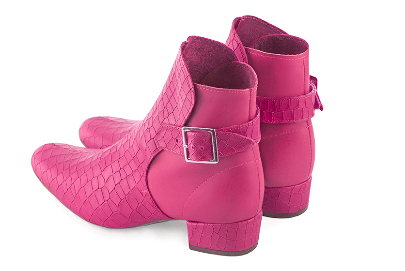 Fuschia pink women's ankle boots with buckles at the back. Round toe. Low block heels. Rear view - Florence KOOIJMAN